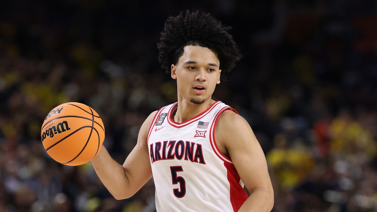 Arizona Wildcats guard Brayden Burries dribbles up the court against Michigan in the 2026 NCAA Final Four.