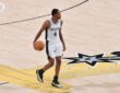 De'Aaron Fox #4 of the San Antonio Spurs drives with the ball during Game 5 of the 2026 NBA Finals against the New York Knicks at Frost Bank Center on June 13, 2026.