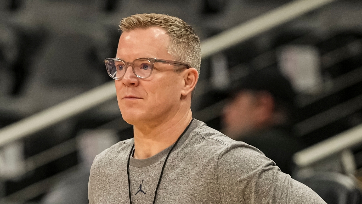 Dusty May, hired as Dallas Mavericks head coach, looks on during a Michigan practice at the NCAA Tournament