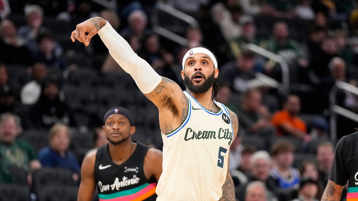 Milwaukee Bucks guard Gary Trent Jr. follows through on a jump shot against the San Antonio Spurs at Fiserv Forum.