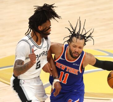 Jalen Brunson of the New York Knicks dribbles against Stephon Castle of the San Antonio Spurs during Game 2 of the 2026 NBA Finals.