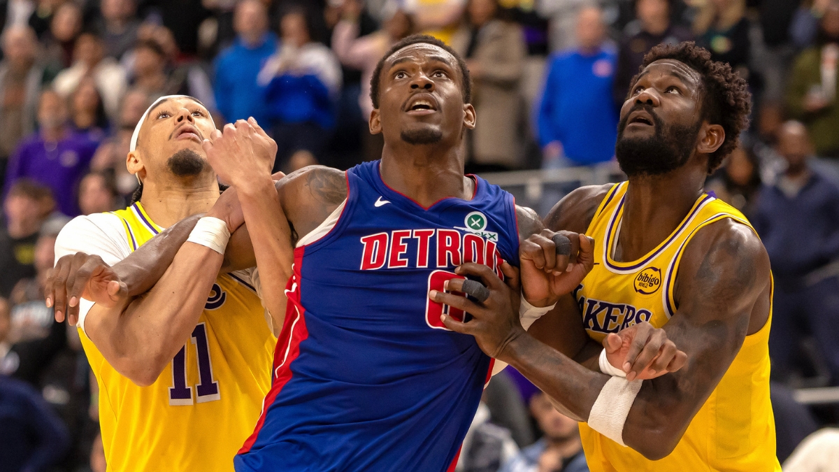 Detroit Pistons center Jalen Duren battles for position between Los Angeles Lakers center Jaxson Hayes and center Deandre Ayton during the second half at Little Caesars Arena