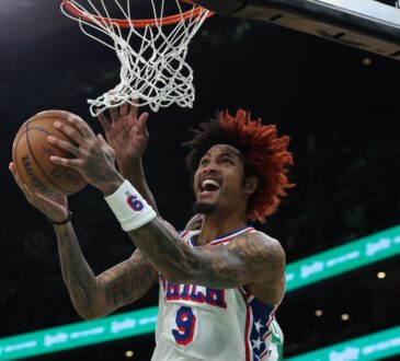 Kelly Oubre Jr. of the Philadelphia 76ers drives in for a layup against the Boston Celtics during the 2026 NBA Playoffs.