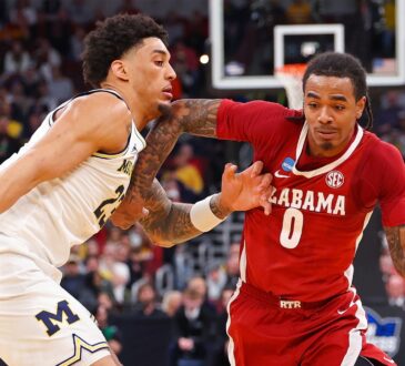 Labaron Philon, a Mavericks draft target, is defended by Michigan's Yaxel Lendeborg