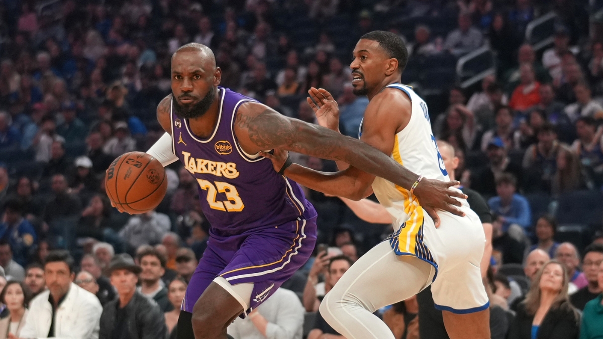 Los Angeles Lakers forward LeBron James drives with the ball against Golden State Warriors guard De'Anthony Melton in the first quarter at Chase Center.