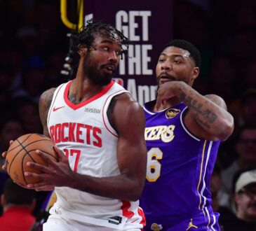 Houston Rockets forward Kevin Durant controls the ball against Los Angeles Lakers guard Marcus Smart during a 2026 NBA Playoffs game at Crypto.com Arena