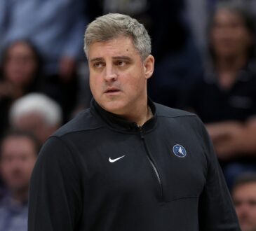 Minnesota Timberwolves assistant coach Micah Nori watching from the sideline during a 2024 playoff game against the Denver Nuggets
