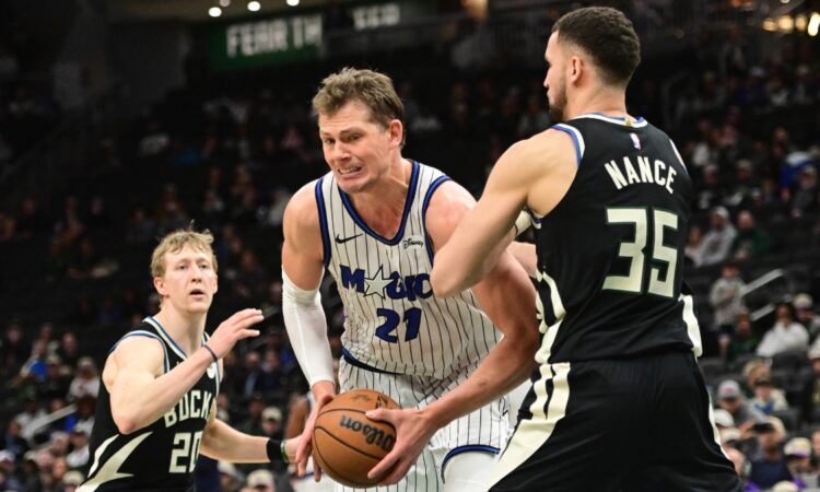 Orlando Magic center Moe Wagner controls the ball against Milwaukee Bucks forward Pete Nance in the fourth quarter at Fiserv Forum on March 8, 2026.
