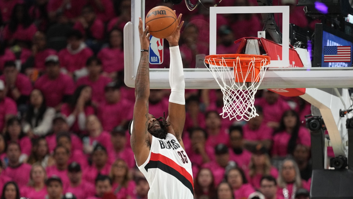Robert Williams III of the Portland Trail Blazers converts an alley-oop dunk against the San Antonio Spurs in the 2026 NBA Playoffs