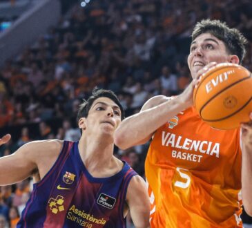 Sergio De Larrea drives to the basket for Valencia Basket against a Barcelona defender in Liga ACB action