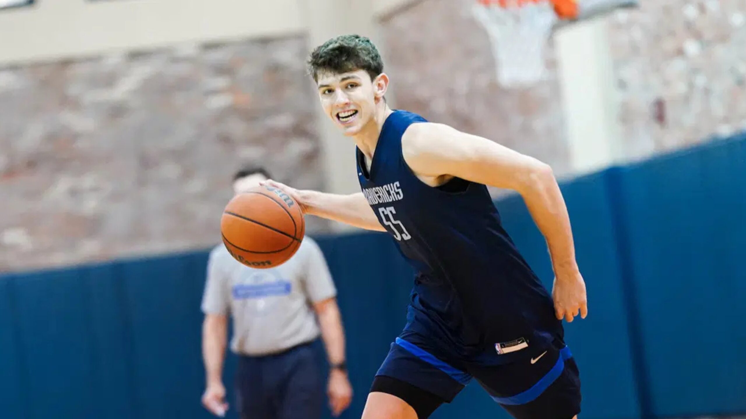 Sergio De Larrea dribbles the ball during Dallas Mavericks Summer League practice ahead of Las Vegas debut
