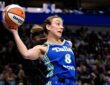 Dallas Wings forward Alanna Smith leaps to keep the ball in bounds against the Chicago Sky at American Airlines Center.