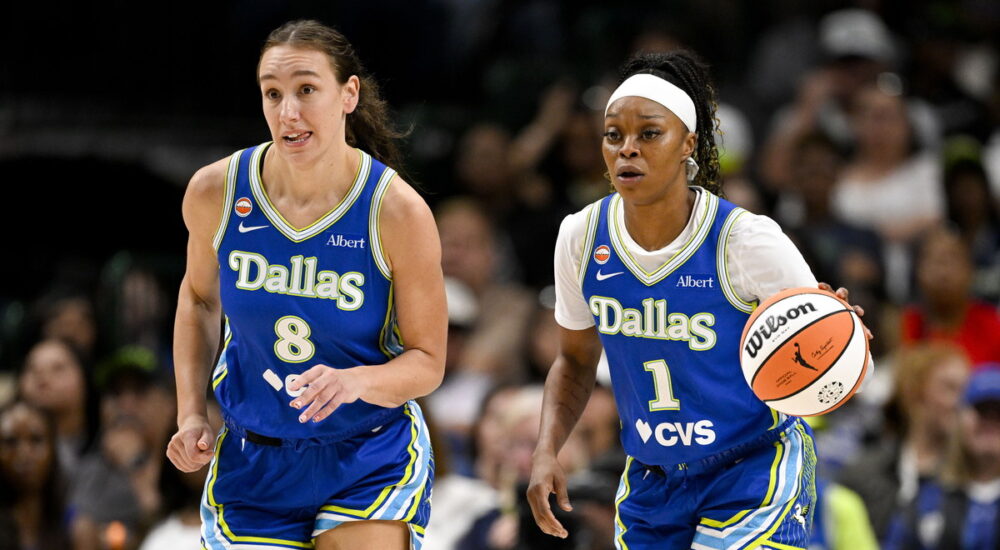 Dallas Wings forward Alanna Smith and guard Odyssey Sims bring the ball up the court against the Chicago Sky.