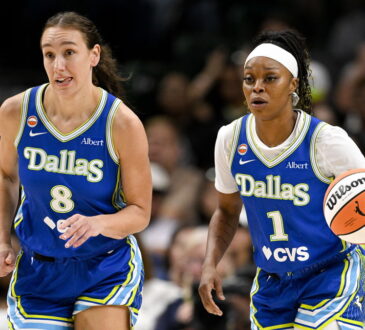 Dallas Wings forward Alanna Smith and guard Odyssey Sims bring the ball up the court against the Chicago Sky.