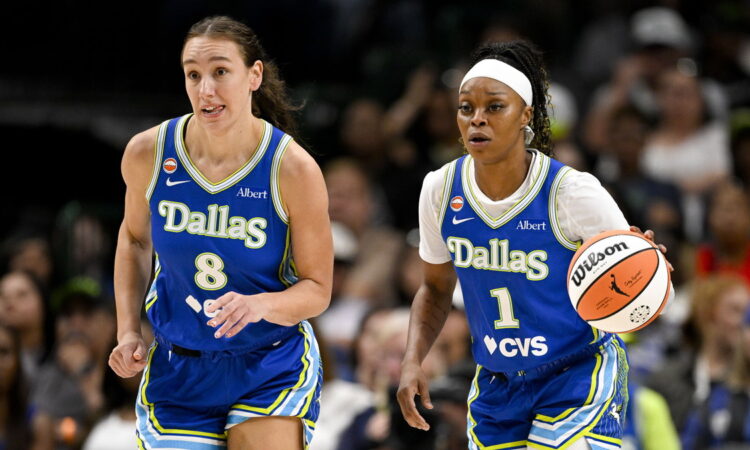 Dallas Wings forward Alanna Smith and guard Odyssey Sims bring the ball up the court against the Chicago Sky.