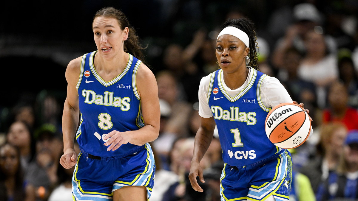 Dallas Wings forward Alanna Smith and guard Odyssey Sims bring the ball up the court against the Chicago Sky.