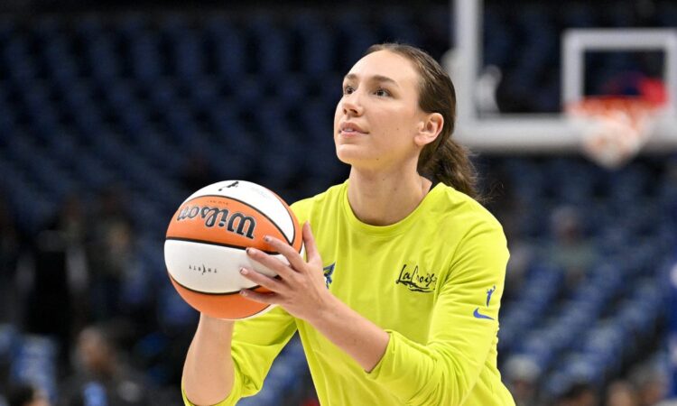 Dallas Wings forward Alanna Smith lines up a shot while warming up before a game against the Chicago Sky