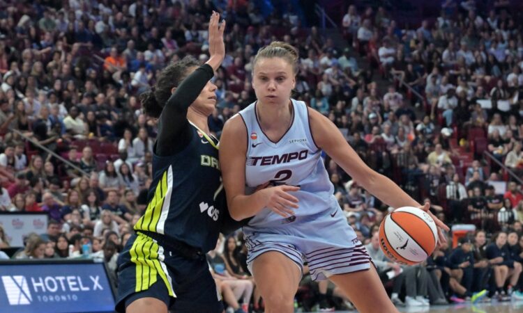 Dallas Wings forward Alysha Clark defends Toronto Tempo forward Laura Juškaitė during the second half at Bell Centre.