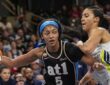 Atlanta Dream forward Angel Reese drives to the basket against Dallas Wings guard Azzi Fudd at Gateway Center Arena