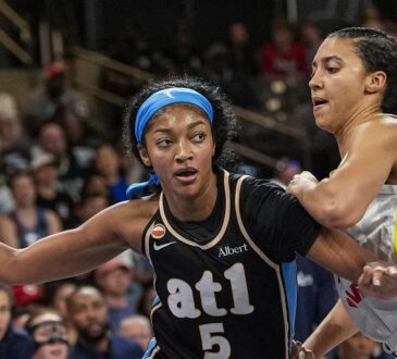 Atlanta Dream forward Angel Reese drives to the basket against Dallas Wings guard Azzi Fudd at Gateway Center Arena