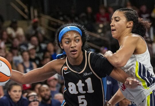Atlanta Dream forward Angel Reese drives to the basket against Dallas Wings guard Azzi Fudd at Gateway Center Arena