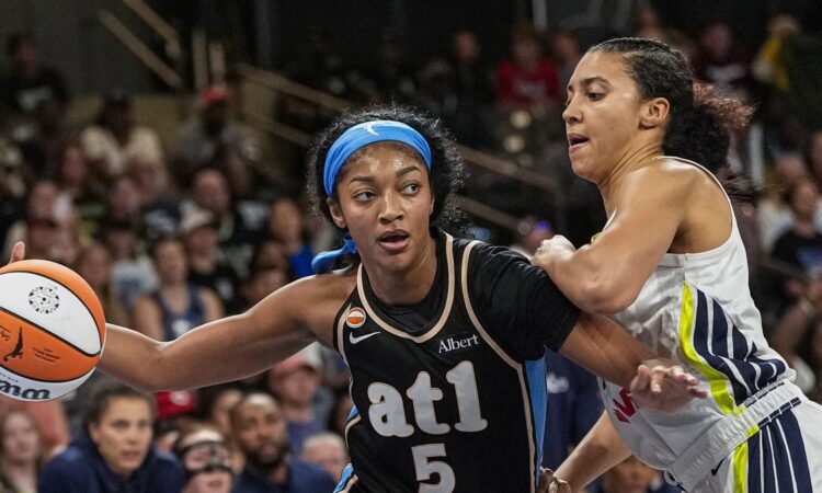 Atlanta Dream forward Angel Reese drives to the basket against Dallas Wings guard Azzi Fudd at Gateway Center Arena