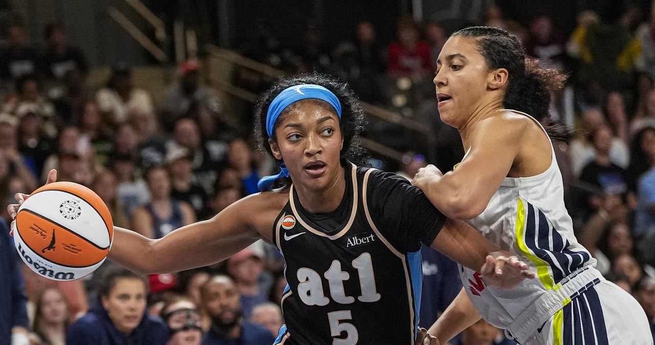 Atlanta Dream forward Angel Reese drives to the basket against Dallas Wings guard Azzi Fudd at Gateway Center Arena