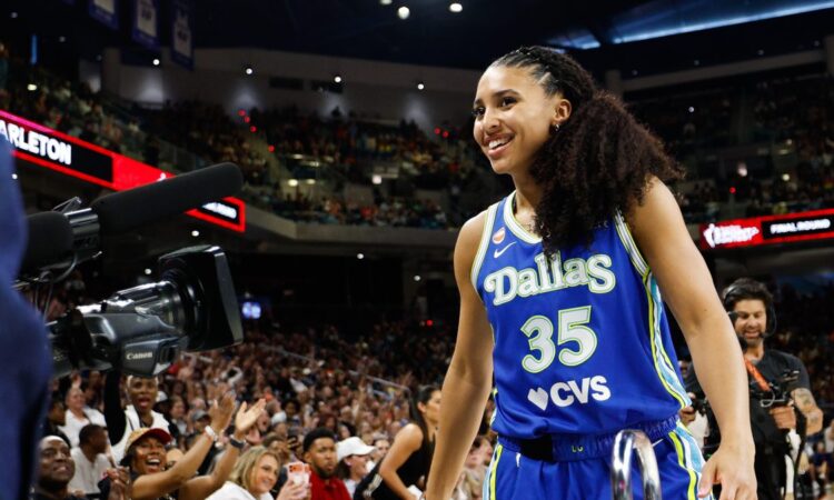 Dallas Wings guard Azzi Fudd smiles after winning the 2026 WNBA 3-Point Contest at Wintrust Arena in Chicago