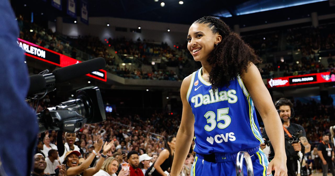 Dallas Wings guard Azzi Fudd smiles after winning the 2026 WNBA 3-Point Contest at Wintrust Arena in Chicago