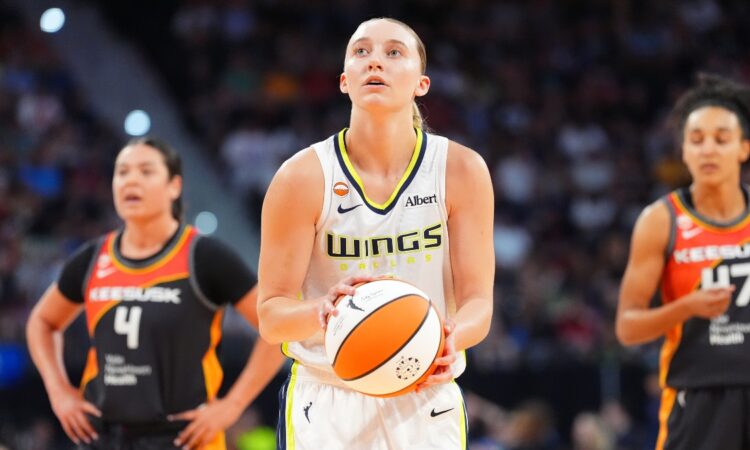 Dallas Wings guard Paige Bueckers shoots a free throw during a game against the Connecticut Sun