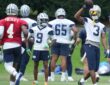 Dallas Cowboys wide receiver George Pickens #3 and quarterback Dak Prescott #4 run through a drill during practice at the Ford Center at The Star.