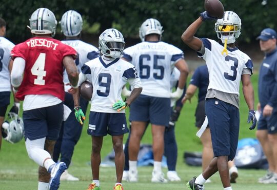 Dallas Cowboys wide receiver George Pickens #3 and quarterback Dak Prescott #4 run through a drill during practice at the Ford Center at The Star.