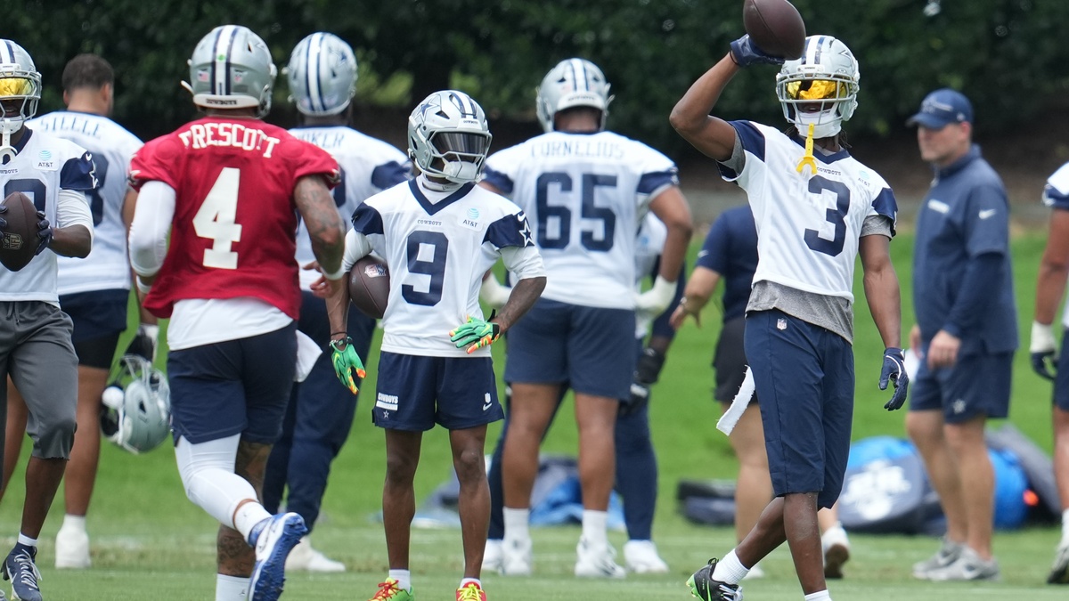 Dallas Cowboys wide receiver George Pickens #3 and quarterback Dak Prescott #4 run through a drill during practice at the Ford Center at The Star.