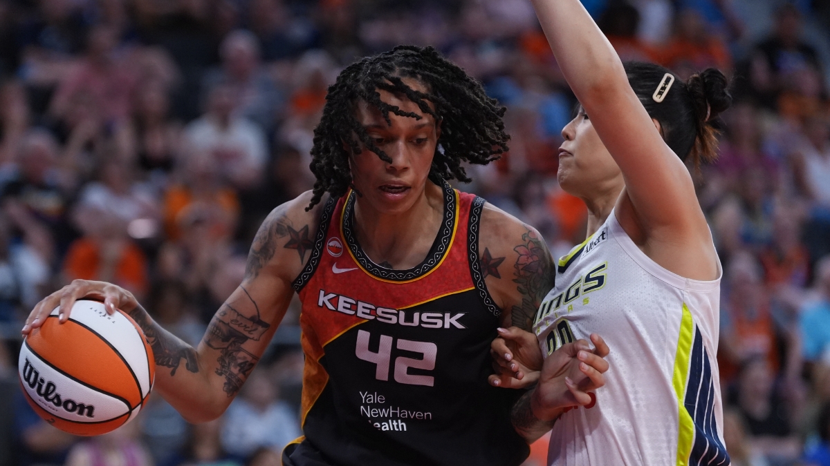 Connecticut Sun center Brittney Griner drives against Dallas Wings center Li Yueru in the second half at PeoplesBank Arena