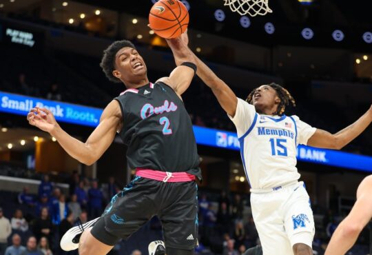 Florida Atlantic guard Isaiah Elohim reaches for a rebound against Memphis guard Julius Thedford at FedExForum