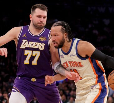 New York Knicks guard Jalen Brunson drives against Los Angeles Lakers guard Luka Dončić at Madison Square Garden