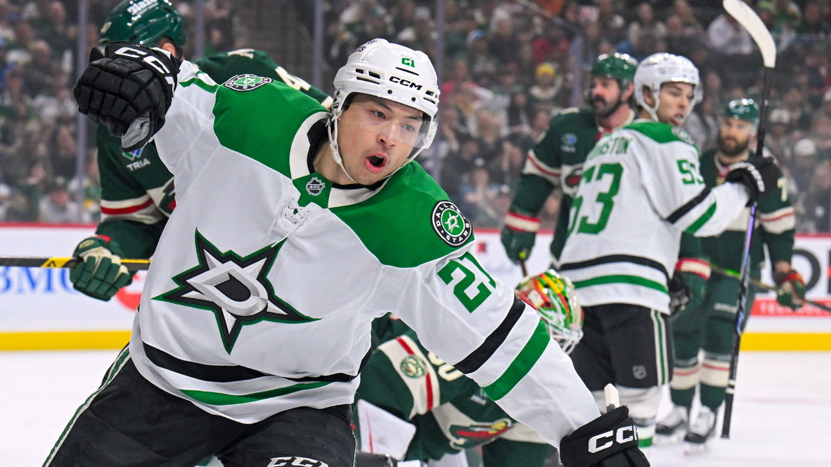 Dallas Stars forward Jason Robertson raises a fist to celebrate a power-play goal against the Minnesota Wild.