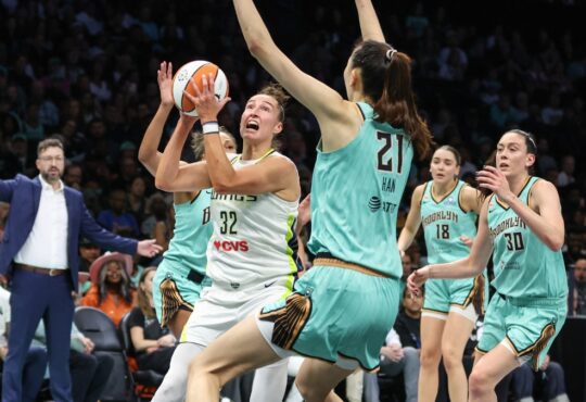 Dallas Wings forward Jessica Shepard drives to the basket against New York Liberty center Han Xu in the first quarter at Barclays Center