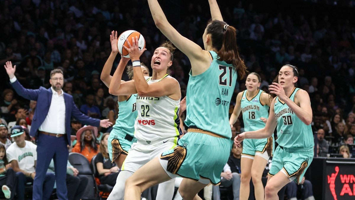 Dallas Wings forward Jessica Shepard drives to the basket against New York Liberty center Han Xu in the first quarter at Barclays Center
