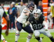 Chicago Bears guard Joe Thuney tries to block Las Vegas Raiders defensive end Maxx Crosby during a pass rush.