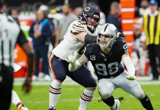 Chicago Bears guard Joe Thuney tries to block Las Vegas Raiders defensive end Maxx Crosby during a pass rush.