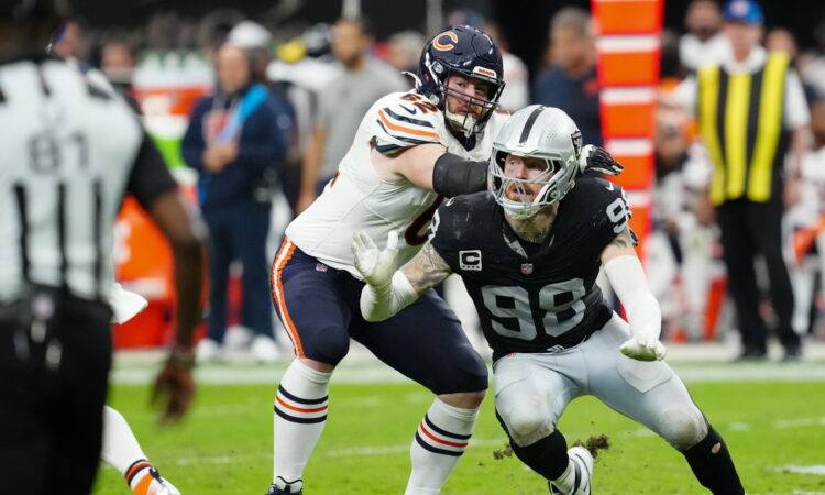 Chicago Bears guard Joe Thuney tries to block Las Vegas Raiders defensive end Maxx Crosby during a pass rush.