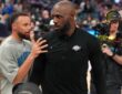 Los Angeles Lakers forward LeBron James #23 meets with Golden State Warriors guard Stephen Curry #30 after a game at Chase Center.