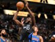 Dallas Mavericks center Moussa Cissé grabs a rebound over Oklahoma City Thunder forward Jaylin Williams at American Airlines Center