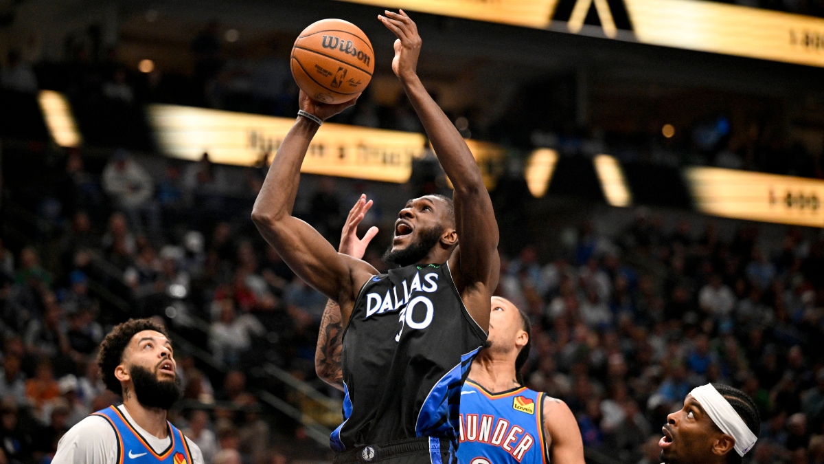 Dallas Mavericks center Moussa Cissé grabs a rebound over Oklahoma City Thunder forward Jaylin Williams at American Airlines Center
