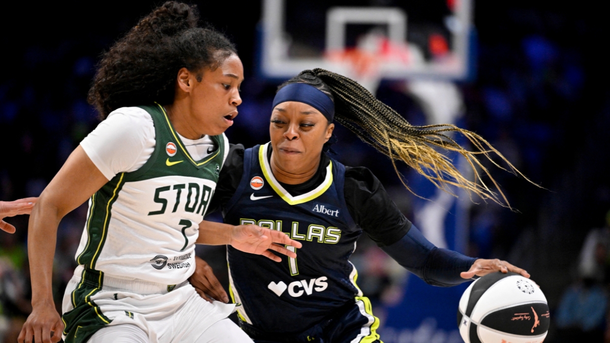 Odyssey Sims of the Dallas Wings drives past Zia Cooke of the Seattle Storm during their WNBA game on June 1, 2026