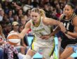 Dallas Wings guard Paige Bueckers drives past Atlanta Dream guard Indya Nivar at Gateway Center Arena in College Park