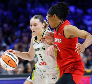Dallas Wings guard Paige Bueckers drives to the basket as Atlanta Dream guard Allisha Gray defends.