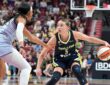 Dallas Wings guard Paige Bueckers drives with the ball as Toronto Tempo forward Isabelle Harrison defends during the first half at Bell Centre.