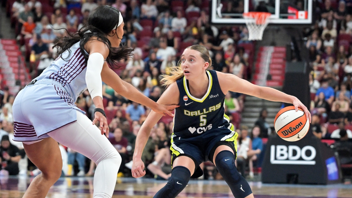 Dallas Wings guard Paige Bueckers drives with the ball as Toronto Tempo forward Isabelle Harrison defends during the first half at Bell Centre.